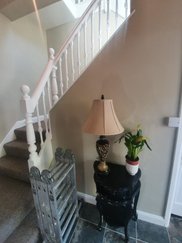 White satin staircase with painted walls